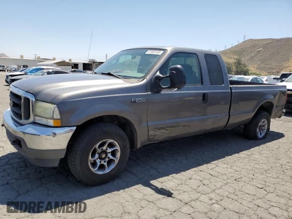 ✅ 2004 Ford F-250 XL • VIN: 1FTNX20L64EB19073 • Lot: 57533145. Listed on Copart with 287,118 mi. Free auction sales archive from the USA and detailed vehicle history report at DreamBid. Image 1.