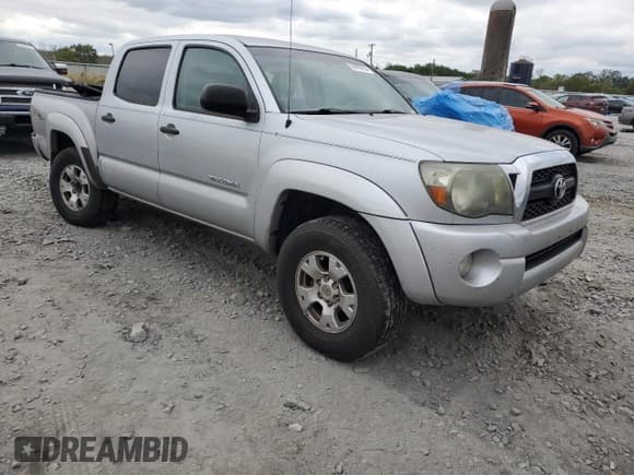 ✅ 2011 Toyota Tacoma • VIN: 3TMLU4EN1BM066411 • Lot: 85929795. Listed on Copart with 165,134 mi. Free auction sales archive from the USA and detailed vehicle history report at DreamBid. Image 4.