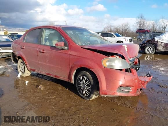 2011 Chevrolet Aveo 1LT z VIN KL1TD5DE5BB134392, wystawiony jako IAAI lot #41352555 z przebiegiem 153 160 mil mil oraz . Historia ofert i sprzedaży dostępna na DreamBid. Obrazek 1.