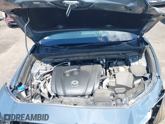 ✅ 2022 Mazda CX-30 S Carbon Edition • VIN: 3MVDMBCL9NM429826 • Lot: 42680808. Listed on IAAI with 28,234 mi. Free auction sales archive from the USA and detailed vehicle history report at DreamBid. Image 10.