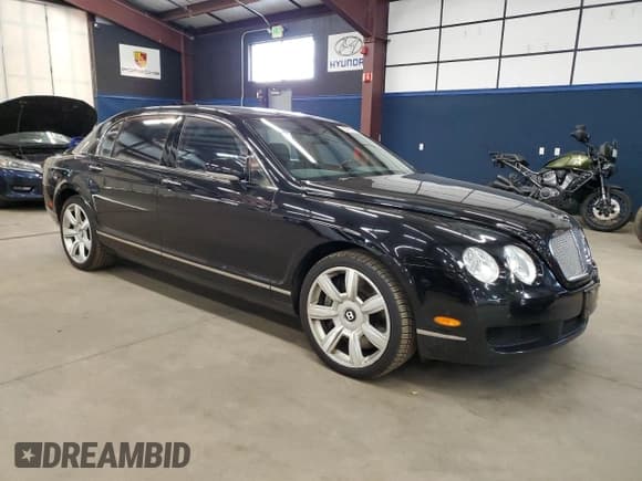 ✅ 2006 Bentley Flying Spur • VIN: SCBBR53WX6C032850 • Лот: 86791375. Опубликован ранее на Copart с пробегом 95 686 миль. Бесплатный доступ к архиву аукционных продаж из США и подробный отчёт об истории автомобиля на DreamBid. Изображение 4.