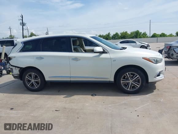 ✅ 2016 Infiniti QX60 • VIN: 5N1AL0MN9GC512376 • Lot: 42872415. Listed on IAAI with 167,814 mi. Free auction sales archive from the USA and detailed vehicle history report at DreamBid. Image 13.
