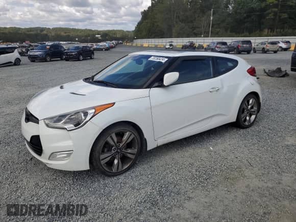 2013 Hyundai Veloster w/Gray Int z VIN KMHTC6AD6DU124843, wystawiony jako Copart lot #73250424 z przebiegiem 113 770 mil mil oraz Czysty tytuł • Clean title. Historia ofert i sprzedaży dostępna na DreamBid. Obrazek 1.