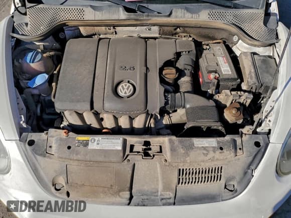 ✅ 2013 Volkswagen Beetle 2.5L • VIN: 3VWJX7AT2DM669016 • Lot: 94439545. Listed on Copart with 82,512 mi. Free auction sales archive from the USA and detailed vehicle history report at DreamBid. Image 11.