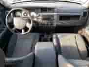 2008 Dodge Dakota z VIN 1D7HW78N38S550177, wystawiony jako Copart lot #77898264 z przebiegiem 117 222 mil mil oraz Szkoda całkowita • Salvage title. Historia ofert i sprzedaży dostępna na DreamBid. Obrazek 8.