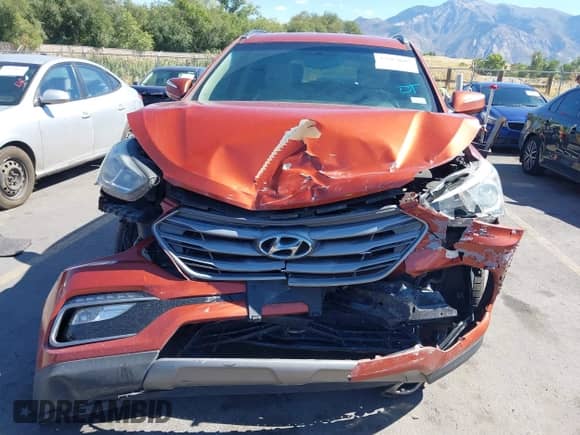 2018 Hyundai Santa Fe 2.4L z VIN 5XYZU3LB8JG523000, wystawiony jako IAAI lot #43263685 z przebiegiem 96 480 mil mil oraz . Historia ofert i sprzedaży dostępna na DreamBid. Obrazek 12.