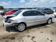 ✅ 2003 Jaguar X-Type 2.5L Manual • VIN: SAJEA51D63XD43901 • Лот: 67848024. Опубликован ранее на Copart с пробегом 128 651 миль. Бесплатный доступ к архиву аукционных продаж из США и подробный отчёт об истории автомобиля на DreamBid. Изображение 3.