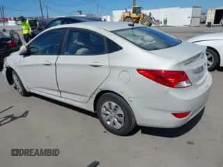 2015 Hyundai Accent GLS with VIN KMHCT4AE4FU936500, listed as a IAAI auction lot 43347520 with 143,412 mi miles and . Bid and sale history available at DreamBid. Image 3.