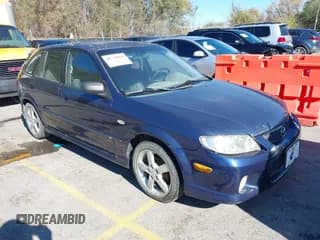 ✅ 2003 Mazda Protege • VIN: JM1BJ245531160512 • Lot: 40736999. Wystawiony na IAAI z przebiegiem 315 252 mil. Bezpłatny archiwum sprzedaży aukcyjnych z USA i szczegółowy raport historii pojazdu na DreamBid. Zdjęcie 1.