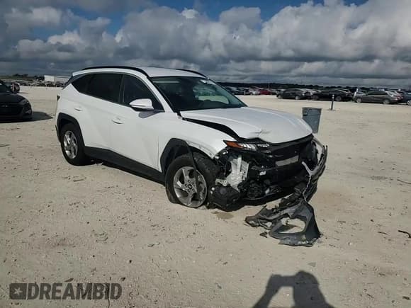 ✅ 2022 Hyundai Tucson SEL • VIN: 5NMJB3AE4NH038493 • Lot: 71890114. Wystawiony na Copart z przebiegiem 29 871 mil. Bezpłatny archiwum sprzedaży aukcyjnych z USA i szczegółowy raport historii pojazdu na DreamBid. Zdjęcie 12.