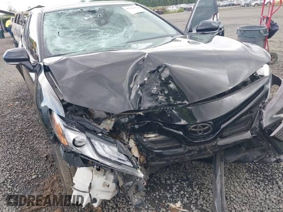 2022 Toyota Camry XSE with VIN 4T1K61BK6NU068584, listed as a IAAI auction lot 42248113 with 59,503 mi miles and . Bid and sale history available at DreamBid. Image 6.