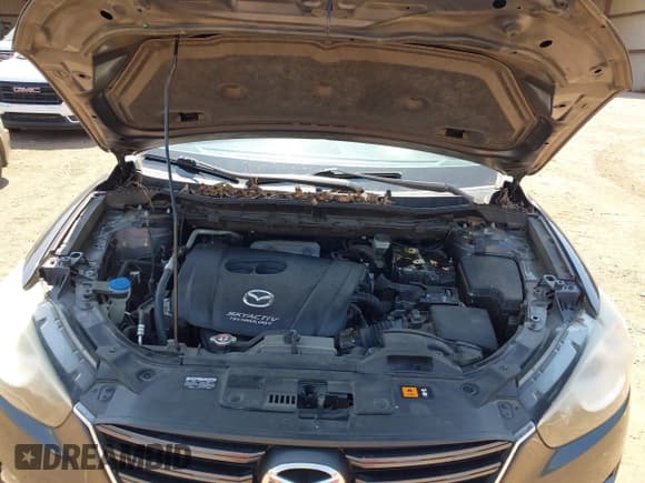 ✅ 2016 Mazda CX-5 Grand Touring • VIN: JM3KE2DYXG0769581 • Lot: 43174558. Listed on IAAI with 206,517 mi. Free auction sales archive from the USA and detailed vehicle history report at DreamBid. Image 10.