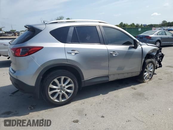 ✅ 2014 Mazda CX-5 Grand Touring • VIN: JM3KE2DY7E0387232 • Lot: 69195815. Listed on Copart with 204,436 mi. Free auction sales archive from the USA and detailed vehicle history report at DreamBid. Image 3.