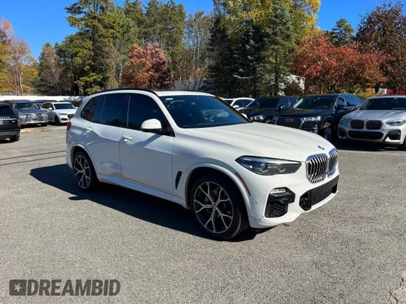 ✅ 2020 BMW X5 sDrive40i • VIN: 5UXCR4C01LLW64024 • Lot: 87126905. Listed on Copart with 198,662 mi. Free auction sales archive from the USA and detailed vehicle history report at DreamBid. Image 1.