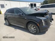 ✅ 2021 Cadillac XT4 FWD Premium Luxury • VIN: 1GYFZCR48MF002468 • Lot: 50878955. Listed on Copart with 76,034 mi. Free auction sales archive from the USA and detailed vehicle history report at DreamBid. Image 4.