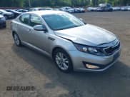 ✅ 2011 Kia Optima EX • VIN: KNAGN4A61B5143424 • Lot: 42776568. Listed on IAAI with 167,168 mi. Free auction sales archive from the USA and detailed vehicle history report at DreamBid. Image 1.