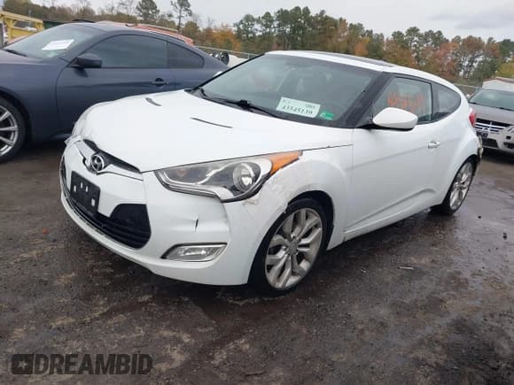 ✅ 2013 Hyundai Veloster w/Black Int • VIN: KMHTC6AD9DU145590 • Lot: 43545139. Wystawiony na IAAI z przebiegiem 155 729 mil. Bezpłatny archiwum sprzedaży aukcyjnych z USA i szczegółowy raport historii pojazdu na DreamBid. Zdjęcie 17.