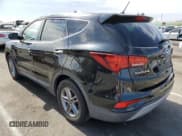 ✅ 2018 Hyundai Santa Fe 2.4L • VIN: 5NMZT3LB6JH098160 • Лот: 65944304. Опубликован ранее на Copart с пробегом 101 051 миль. Бесплатный доступ к архиву аукционных продаж из США и подробный отчёт об истории автомобиля на DreamBid. Изображение 2.
