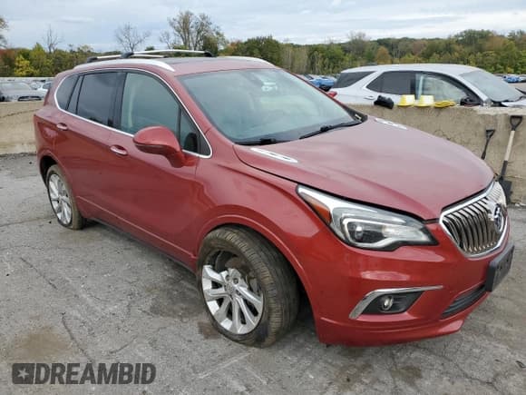 ✅ 2016 Buick Envision Premium II • VIN: LRBFXFSXXGD188370 • Lot: 82268865. Listed on Copart with 82,702 mi. Free auction sales archive from the USA and detailed vehicle history report at DreamBid. Image 4.