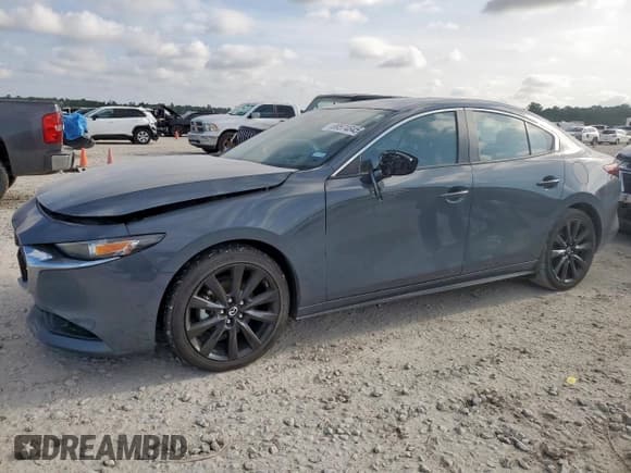 ✅ 2022 Mazda 3 Carbon Edition • VIN: 3MZBPACL3NM318745 • Lot: 69574845. Listed on Copart with 27,726 mi. Free auction sales archive from the USA and detailed vehicle history report at DreamBid. Image 1.