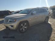 ✅ 2014 Jeep Grand Cherokee Overland • VIN: 1C4RJFCT9EC147999 • Lot: 89689645. Listed on Copart with 133,640 mi. Free auction sales archive from the USA and detailed vehicle history report at DreamBid. Image 1.