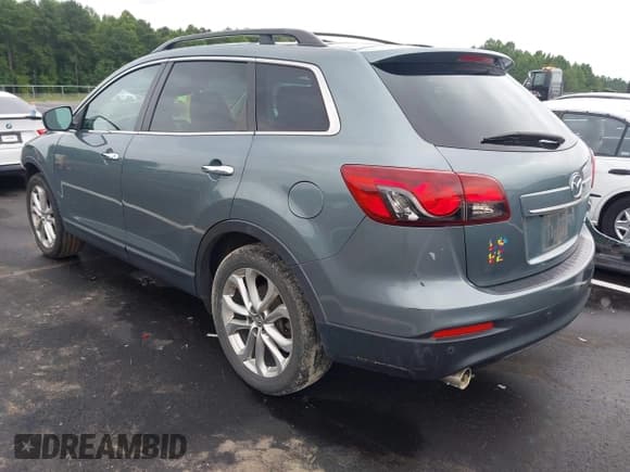 ✅ 2013 Mazda CX-9 Grand Touring • VIN: JM3TB2DA5D0409033 • Lot: 42921708. Listed on IAAI with 186,233 mi. Free auction sales archive from the USA and detailed vehicle history report at DreamBid. Image 3.