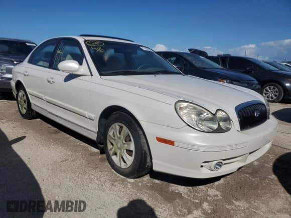 2002 Hyundai Sonata z VIN KMHWF25S82A665767, wystawiony jako Copart lot #77455604 z przebiegiem 38 138 mil mil oraz Nie do naprawy • Non repairable. Historia ofert i sprzedaży dostępna na DreamBid. Obrazek 4.
