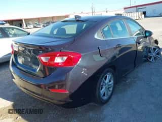 2016 Chevrolet Cruze LT z VIN 1G1BE5SM5G7301655, wystawiony jako IAAI lot #43610631 z przebiegiem Nie podano mil oraz . Historia ofert i sprzedaży dostępna na DreamBid. Obrazek 4.