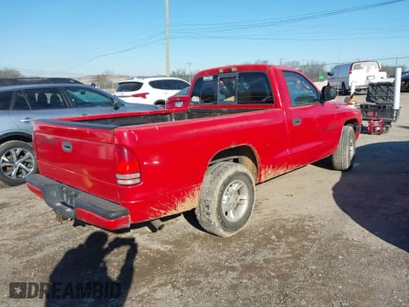 2000 Dodge Dakota with VIN 1B7FL26X5YS516338, listed as a IAAI auction lot 41609489 with 216,058 mi miles and . Bid and sale history available at DreamBid. Image 4.