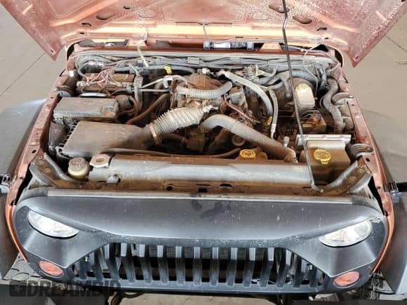 ✅ 2010 Jeep Wrangler Unlimited Mountain • VIN: 1J4BA3H13AL191797 • Lot: 61108225. Wystawiony na Copart z przebiegiem 138 604 mil. Bezpłatny archiwum sprzedaży aukcyjnych z USA i szczegółowy raport historii pojazdu na DreamBid. Zdjęcie 11.