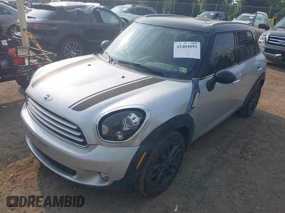 ✅ 2012 MINI Countryman • VIN: WMWZB3C5XCWM30143 • Lot: 42404893. Listed on IAAI with 143,836 mi. Free auction sales archive from the USA and detailed vehicle history report at DreamBid. Image 2.