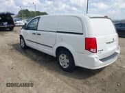 ✅ 2012 Ram Cargo Van • VIN: 2C4JDGAG0CR272362 • Lot: 41781776. Listed on IAAI with 128,114 mi. Free auction sales archive from the USA and detailed vehicle history report at DreamBid. Image 3.