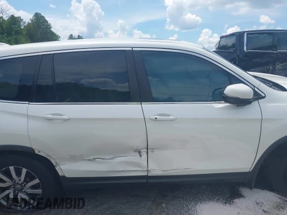 ✅ 2019 Honda Pilot EX-L • VIN: 5FNYF5H51KB008630 • Lot: 42966581. Listed on IAAI with 182,416 mi. Free auction sales archive from the USA and detailed vehicle history report at DreamBid. Image 13.
