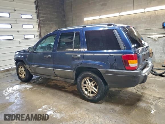 ✅ 2004 Jeep Grand Cherokee Laredo • VIN: 1J4GW48S14C391300 • Lot: 95605255. Listed on Copart with 255,098 mi. Free auction sales archive from the USA and detailed vehicle history report at DreamBid. Image 2.
