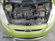 ✅ 2011 Ford Fiesta SES • VIN: 3FADP4FJ9BM147122 • Lot: 90666035. Wystawiony na Copart z przebiegiem 133 206 mil. Bezpłatny archiwum sprzedaży aukcyjnych z USA i szczegółowy raport historii pojazdu na DreamBid. Zdjęcie 11.