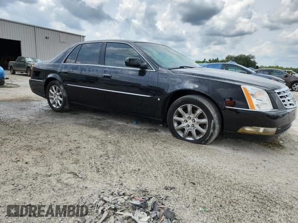 ✅ 2008 Cadillac DTS 1SA • VIN: 1G6KD57YX8U163090 • Lot: 63102745. Listed on Copart with 169,352 mi. Free auction sales archive from the USA and detailed vehicle history report at DreamBid. Image 4.