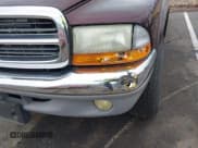 ✅ 2004 Dodge Dakota SLT • VIN: 1D7HG48NX4S751497 • Lot: 41737935. Wystawiony na IAAI z przebiegiem 106 064 mil. Bezpłatny archiwum sprzedaży aukcyjnych z USA i szczegółowy raport historii pojazdu na DreamBid. Zdjęcie 6.