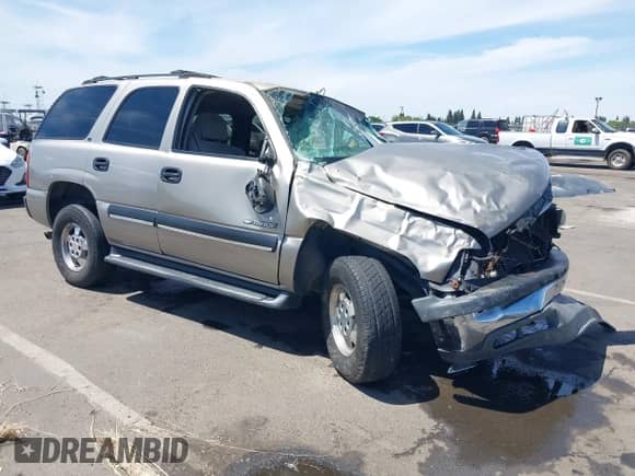 2001 Chevrolet Tahoe LT z VIN 1GNEK13T81R122136, wystawiony jako IAAI lot #42272857 z przebiegiem 216 060 mil mil oraz . Historia ofert i sprzedaży dostępna na DreamBid. Obrazek 1.
