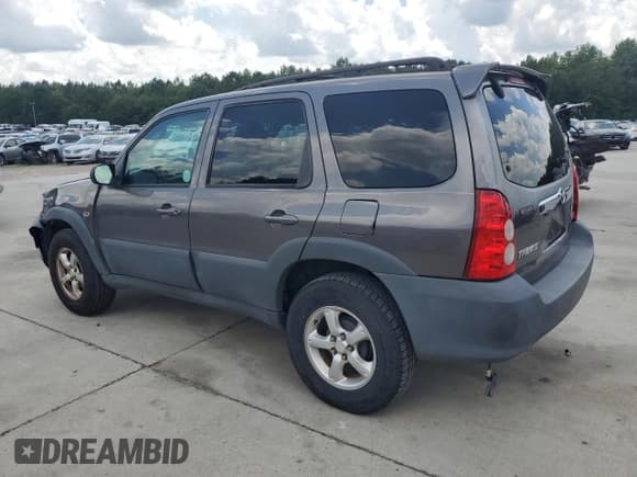 ✅ 2005 Mazda Tribute i • VIN: 4F2YZ02Z45KM64196 • Lot: 64272895. Listed on Copart with 158,256 mi. Free auction sales archive from the USA and detailed vehicle history report at DreamBid. Image 2.