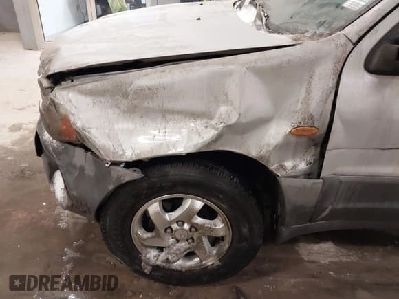 ✅ 2003 Mazda Tribute DX • VIN: 4F2YZ02B73KM43813 • Лот: 41575708. Опубликован ранее на IAAI с пробегом 202 214 миль. Бесплатный доступ к архиву аукционных продаж из США и подробный отчёт об истории автомобиля на DreamBid. Изображение 6.