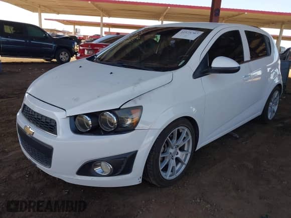 2013 Chevrolet Sonic LT with VIN 1G1JD6SBXD4222966, listed as a IAAI auction lot 42575707 with 140,605 mi miles and . Bid and sale history available at DreamBid. Image 2.