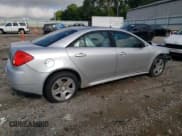 ✅ 2009 Pontiac G6 1SB • VIN: 1G2ZJ57B694272989 • Lot: 64078345. Wystawiony na Copart z przebiegiem 235 764 mil. Bezpłatny archiwum sprzedaży aukcyjnych z USA i szczegółowy raport historii pojazdu na DreamBid. Zdjęcie 3.