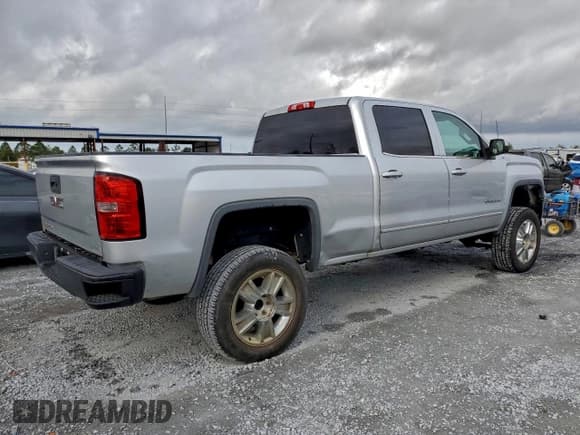 ✅ 2014 GMC Sierra 1500 SLE • VIN: 3GTU2UEC3EG118679 • Лот: 95316665. Опубликован ранее на Copart с пробегом 135 488 миль. Бесплатный доступ к архиву аукционных продаж из США и подробный отчёт об истории автомобиля на DreamBid. Изображение 3.