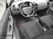 2003 Hyundai Accent GL with VIN KMHCG35C53U258469, listed as a Copart auction lot 82977294 with 99,136 mi miles and Clean title. Bid and sale history available at DreamBid. Image 8.