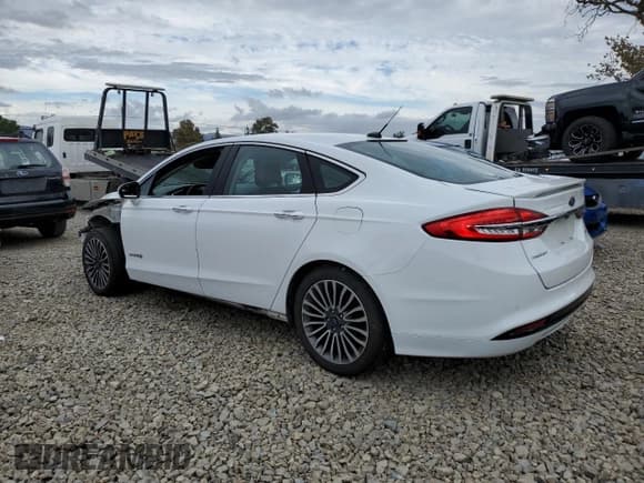 ✅ 2017 Ford Fusion Hybrid Titanium • VIN: 3FA6P0RU7HR187914 • Lot: 82234005. Listed on Copart with 290,959 mi. Free auction sales archive from the USA and detailed vehicle history report at DreamBid. Image 2.