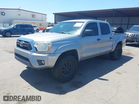 ✅ 2014 Toyota Tacoma • VIN: 3TMLU4EN3EM136656 • Лот: 43121187. Опубликован ранее на IAAI с пробегом 90 055 миль. Бесплатный доступ к архиву аукционных продаж из США и подробный отчёт об истории автомобиля на DreamBid. Изображение 2.