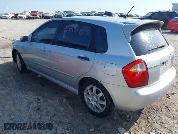 ✅ 2006 Kia Spectra • VIN: KNAFE161365208111 • Лот: 41886193. Опубликован ранее на IAAI с пробегом 292 535 миль. Бесплатный доступ к архиву аукционных продаж из США и подробный отчёт об истории автомобиля на DreamBid. Изображение 3.