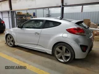 ✅ 2014 Hyundai Veloster Turbo • VIN: KMHTC6AE0EU185261 • Lot: 85904334. Listed on Copart with 88,351 mi. Free auction sales archive from the USA and detailed vehicle history report at DreamBid. Image 2.