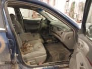 ✅ 2004 Chevrolet Impala • VIN: 2G1WF52E549293798 • Lot: 43818763. Listed on IAAI with 243,403 mi. Free auction sales archive from the USA and detailed vehicle history report at DreamBid. Image 5.