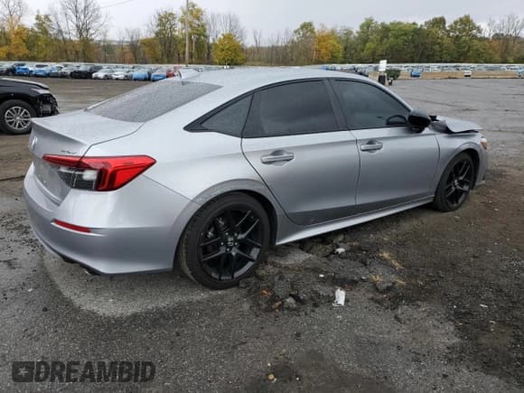 ✅ 2023 Honda Civic Sport • VIN: 2HGFE2F55PH551137 • Lot: 87269765. Wystawiony na Copart z przebiegiem 61 799 mil. Bezpłatny archiwum sprzedaży aukcyjnych z USA i szczegółowy raport historii pojazdu na DreamBid. Zdjęcie 3.